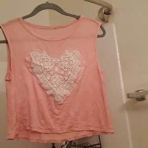 Coral crop top with crocheted heart